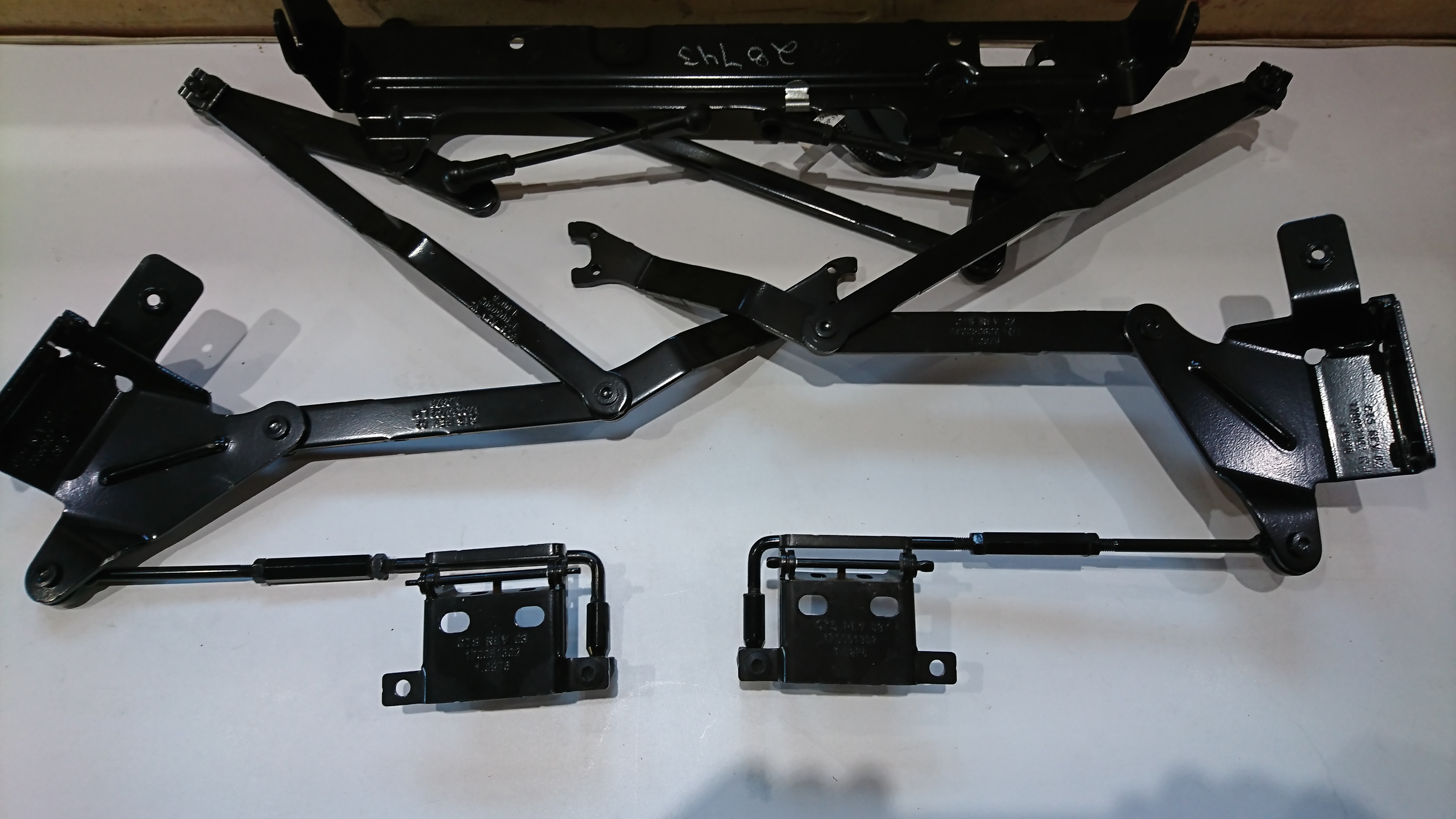 Convertible Top Stowage Compartment link assembly 2004.JPG