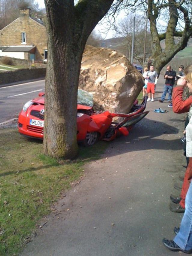 Rock-on-top-of-car.jpg