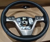 Stock all leather steering wheel.jpg